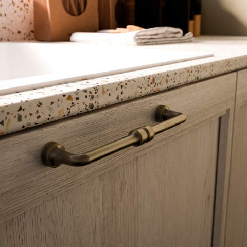 Uchwyt meblowy do szafek Baghdad rozstaw 128mm Stare złoto EMUCA - 20 Sztuk