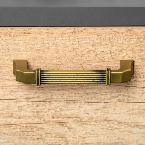 Uchwyt meblowy do szafek Bangkok rozstaw 160mm stare złoto EMUCA - 20 Sztuk